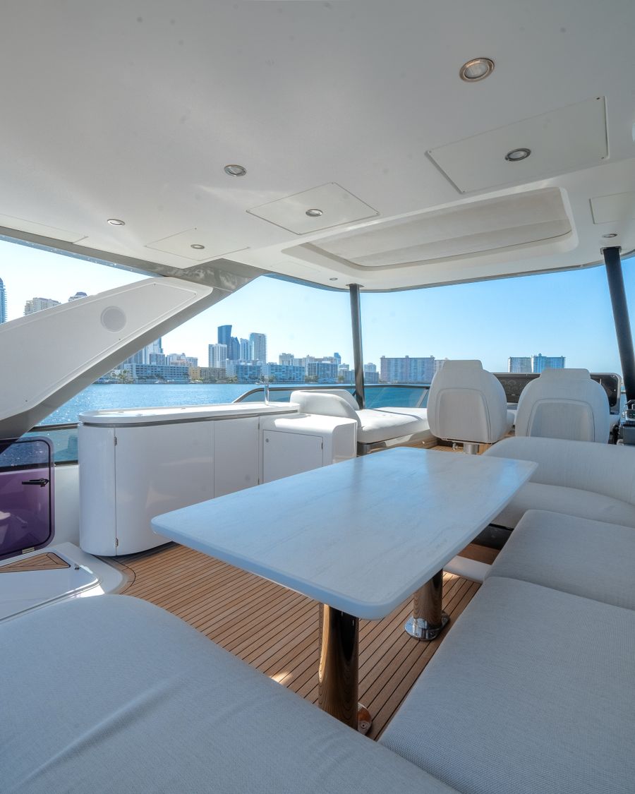 Azimut Fly 68 flybridge lounge under the Etna Grey hardtop